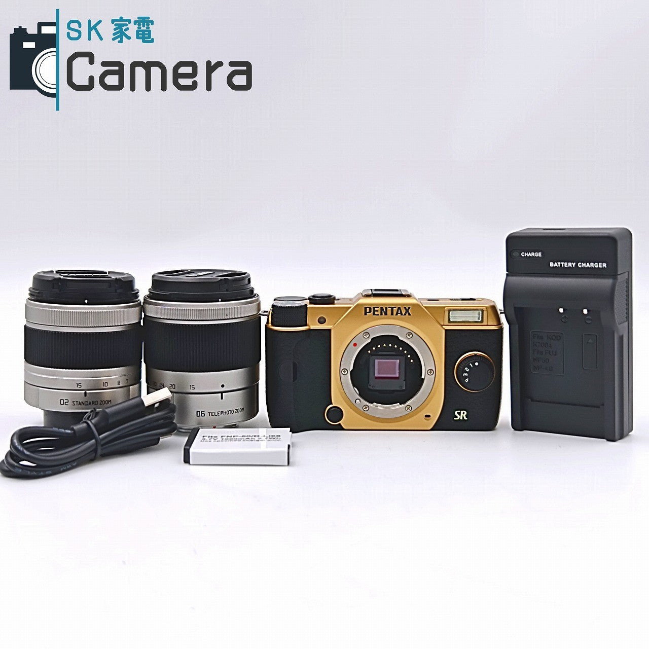 【中古】 PENTAX Q7 GOLD SMC PENTAX 5-15ｍｍ F2.8-4.5 ED AL 02 STANDARD 15-45ｍｍ F2.8 ED 06 TELEPHOTO 電池 充電器付 ゴールド